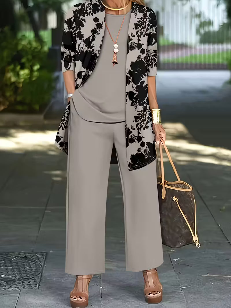 Women's fashionable and casual style set featuring a chiffon shawl and inner strappy printed pants, a daily casual 3pcs set