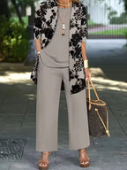 Women's fashionable and casual style set featuring a chiffon shawl and inner strappy printed pants, a daily casual 3pcs set