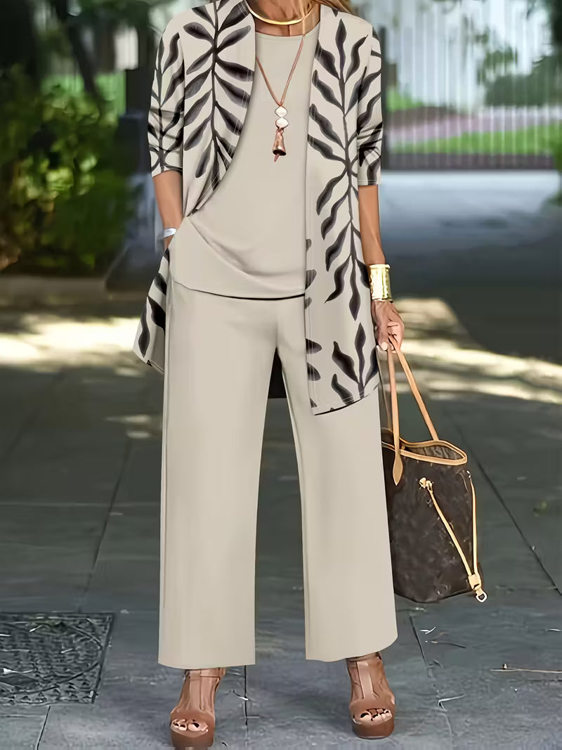 Women's fashionable and casual style set featuring a chiffon shawl and inner strappy printed pants, a daily casual 3pcs set